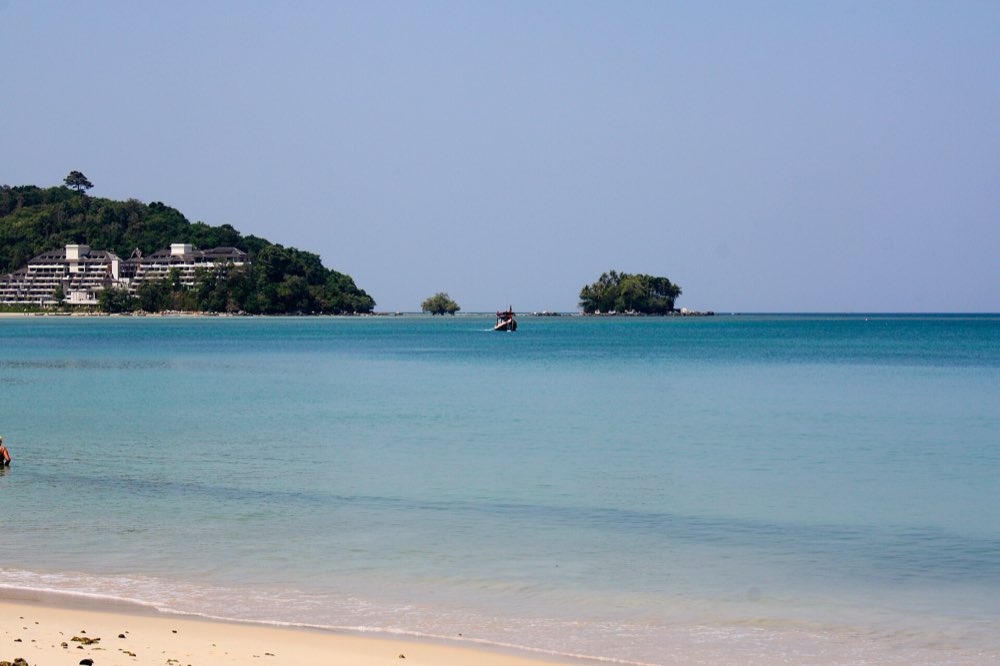 Calm turquoise water off Nai Yang Beach